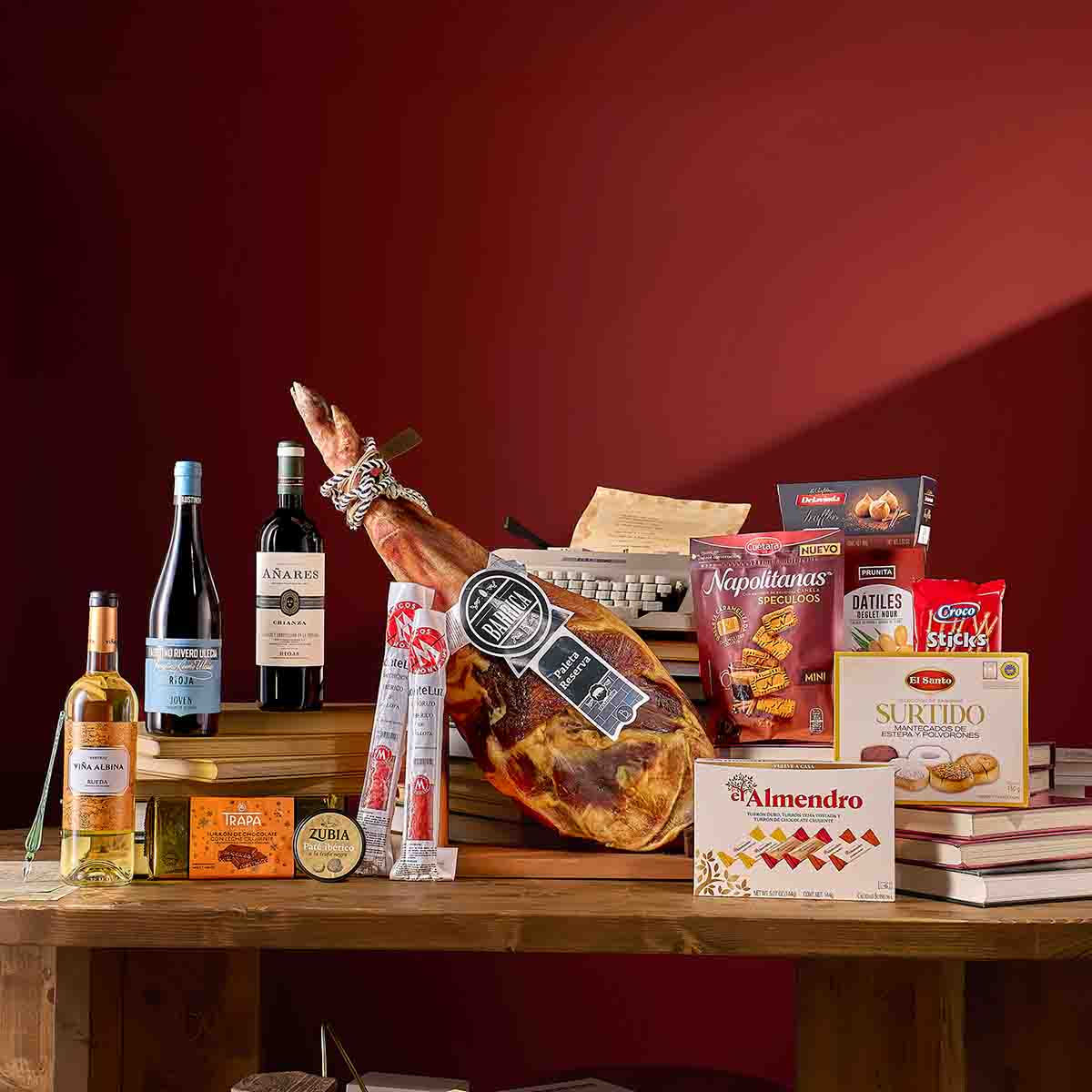 Lote navideño con paleta, vino, dulce y salado